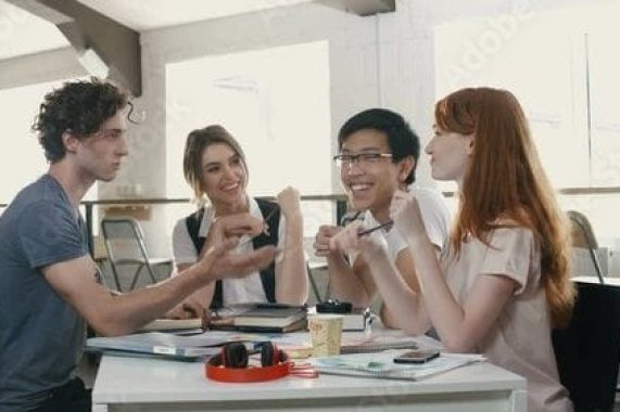 Stock Image_ Multiethnic group of happy young…